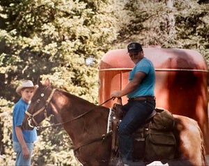 “Corey Rudolph at 17 with father on horseback, continuing family ranch legacy.”