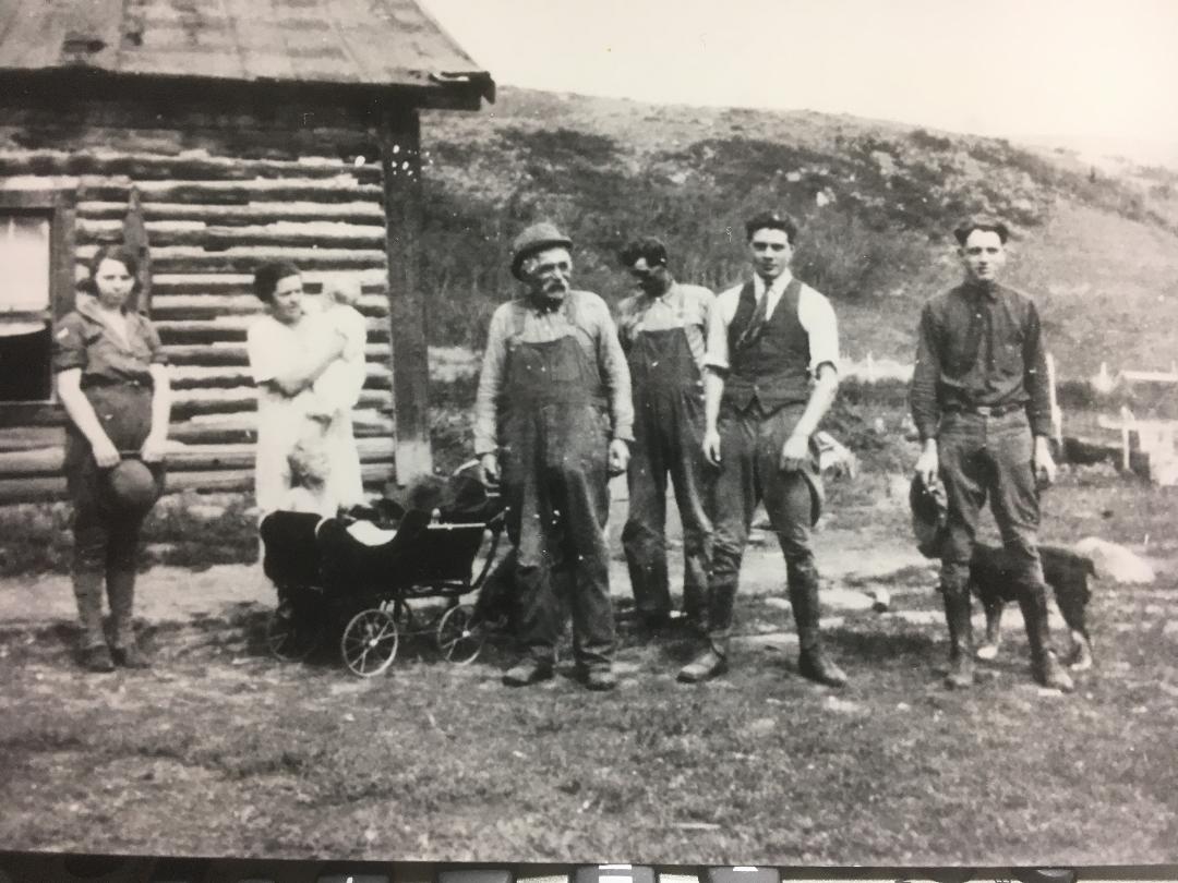 “Rudolph family on ranch, early 1900s—Franz Frederick in overalls, family and baby carriage, Teton Valley, Idaho.”