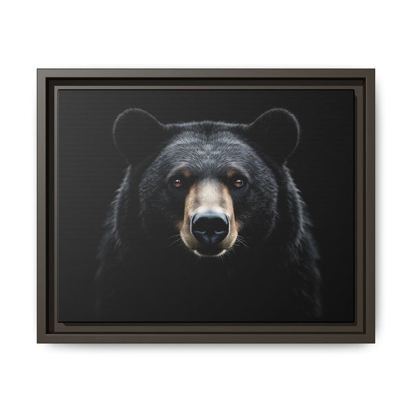 Framed canvas art of a black bear face, espresso-brown frame with inner mat