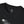 Black tee collar with small logo and partial cowboy-on-horse graphic print.
