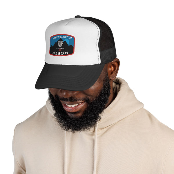 Bison trucker hat with white front, black mesh sides, and curved brim side view