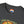 Charcoal crew-neck T-shirt with Western logo patch and partial graphic at hem.