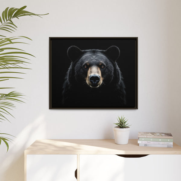 Framed canvas bear wall art with centered dark bear face portrait in a black frame