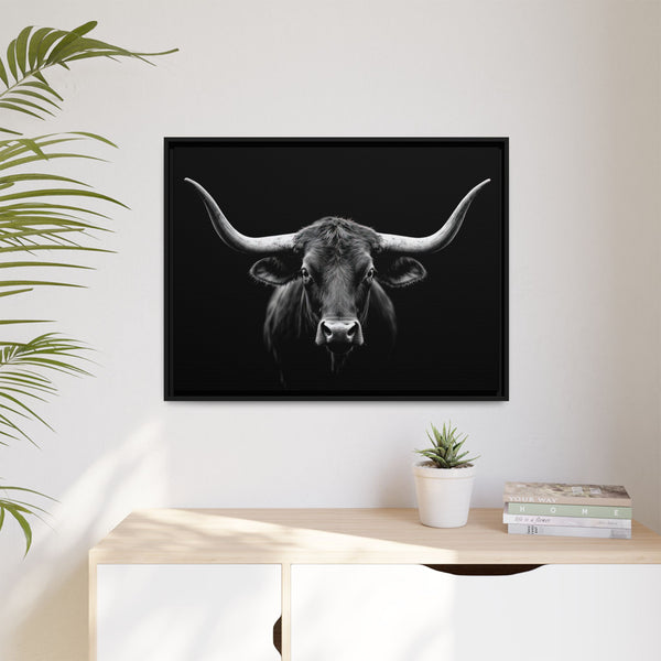 Framed canvas wall art with black frame, small grayscale bull head with horns