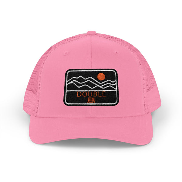 Pink trucker hat with pink mesh panels and front Double HR patch with orange dot