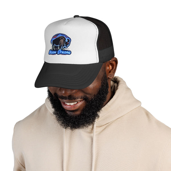 Bison Strong trucker hat on model: white front panel, black mesh back, black brim