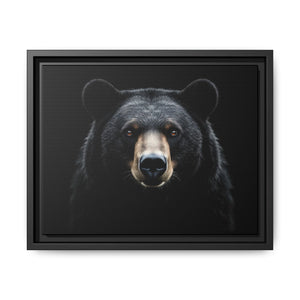 Framed canvas art of a black bear face, black frame with inner mat