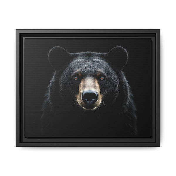 Framed canvas art of a black bear face, black frame with inner mat