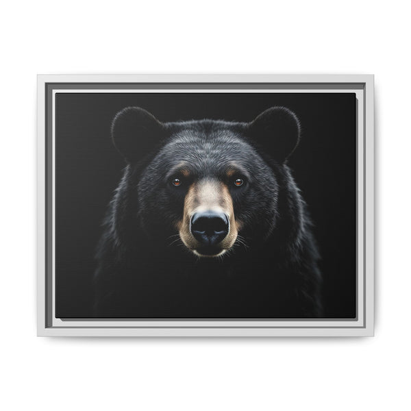 Framed canvas art of a black bear face, light gray frame with dark inner mat