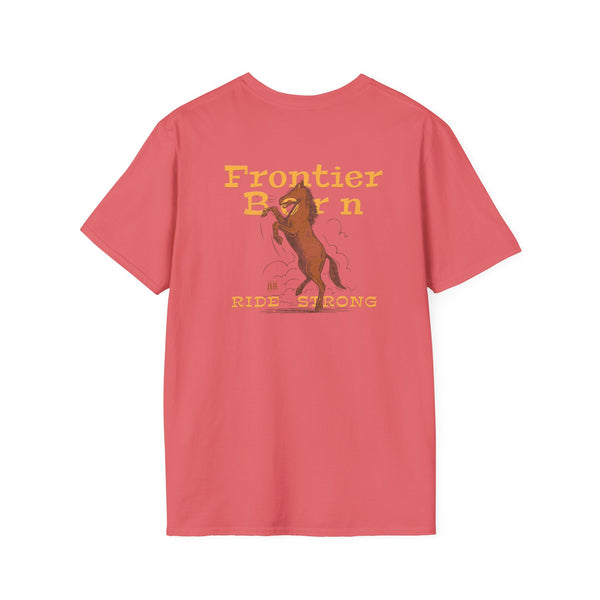 Coral pink western graphic T-shirt with cowboy rider and “Ride Strong” text