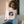 White women's cropped hooded sweatshirt with front graphic and long sleeves