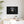 Framed canvas bear portrait with white frame, small wall-hung bear face