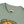Light green T-shirt crew neck with logo label and top of graphic