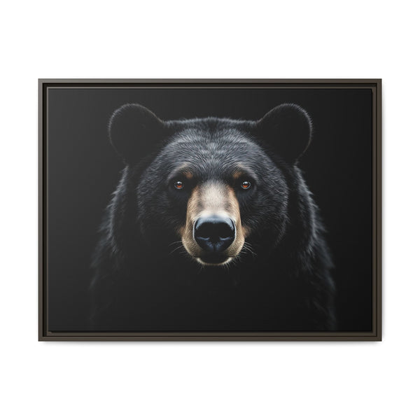 Framed canvas wall art featuring a black bear head portrait centered in the frame
