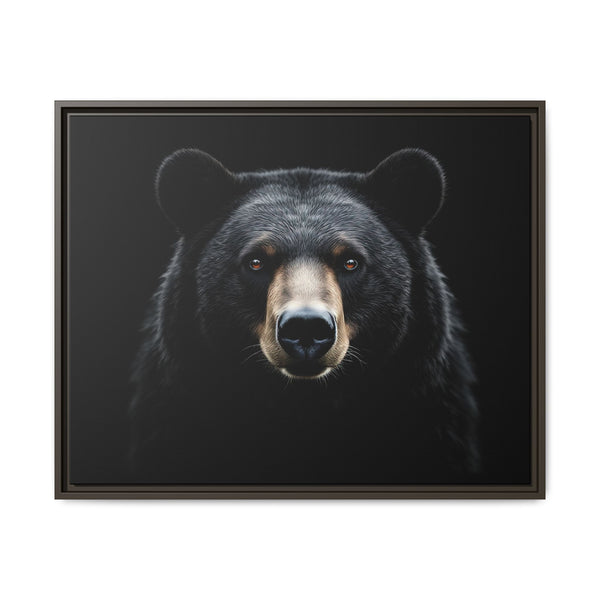 Framed canvas wall art of a black bear face portrait in a dark brown frame