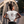White crew-neck graphic T-shirt with back print of skull and riding text