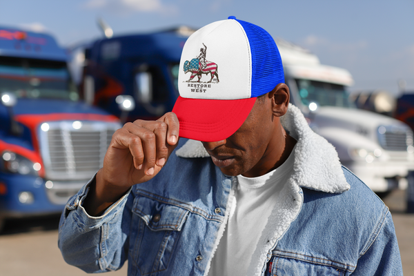 White and blue trucker hat with red brim and Restore West horse graphic