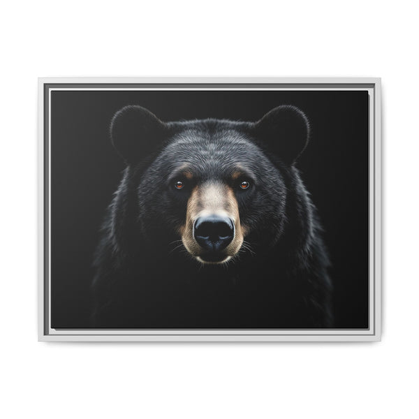 Framed canvas wall art with a black bear face portrait in a light silver frame