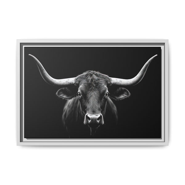 Framed western canvas art with a monochrome bucking bull head on black, silver frame
