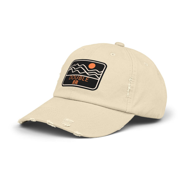 Stone distressed dad hat, side view, with front patch logo and frayed brim