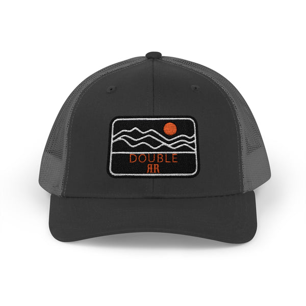 Black trucker hat with dark gray mesh panels and front Double HR patch with orange dot
