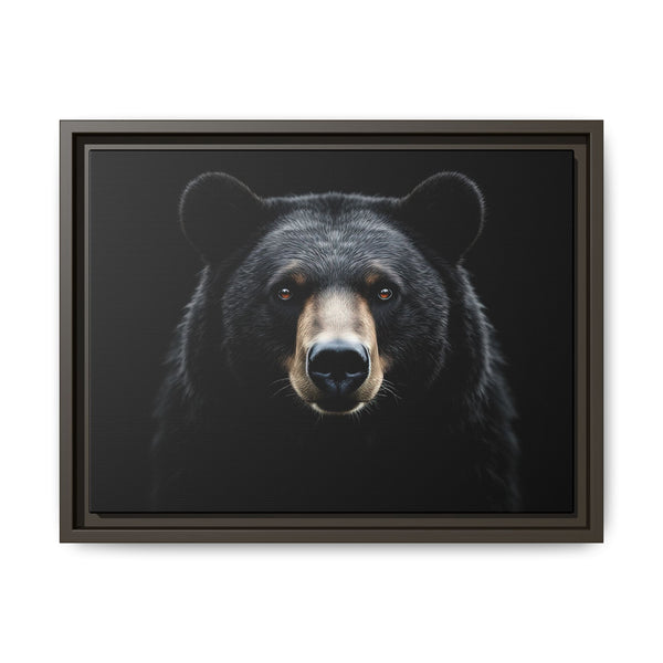 Framed canvas art of a black bear portrait, dark brown frame with inner mat