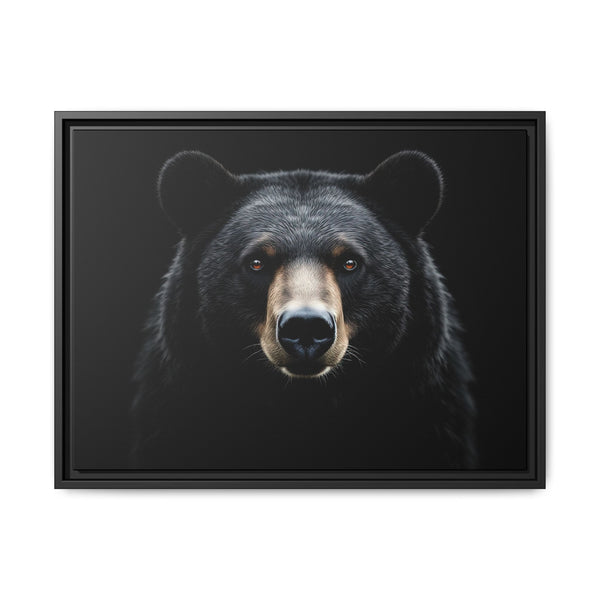 Framed canvas art showing a black bear head and shoulders, black frame