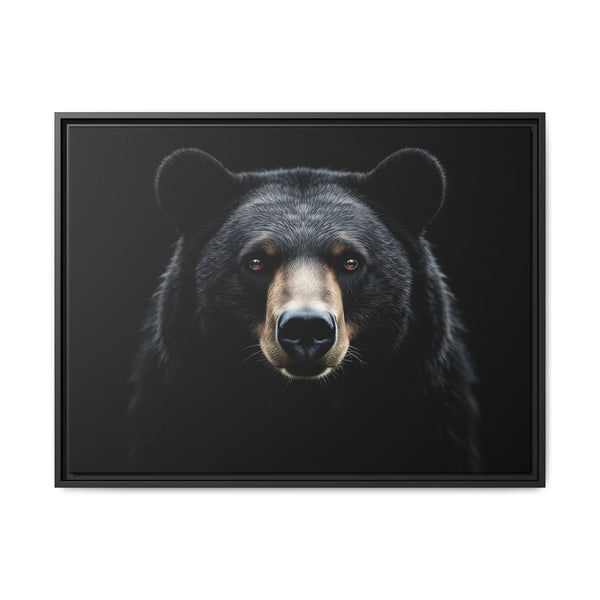 Framed canvas art of a black bear portrait, black frame and dark background