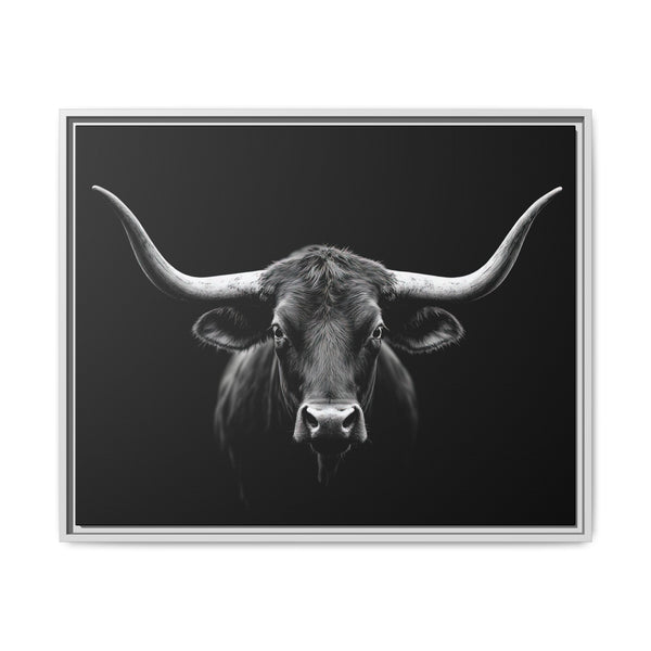 Framed western canvas art with a monochrome bucking bull head on black, silver frame