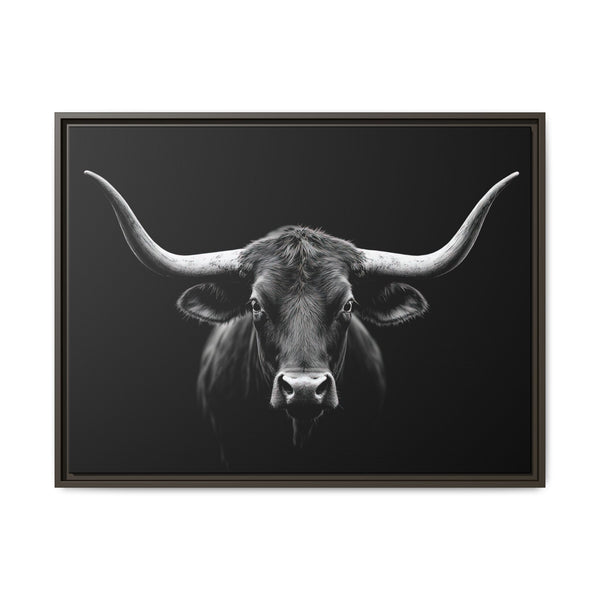 Framed western canvas art of a grayscale bull head with long horns, dark frame