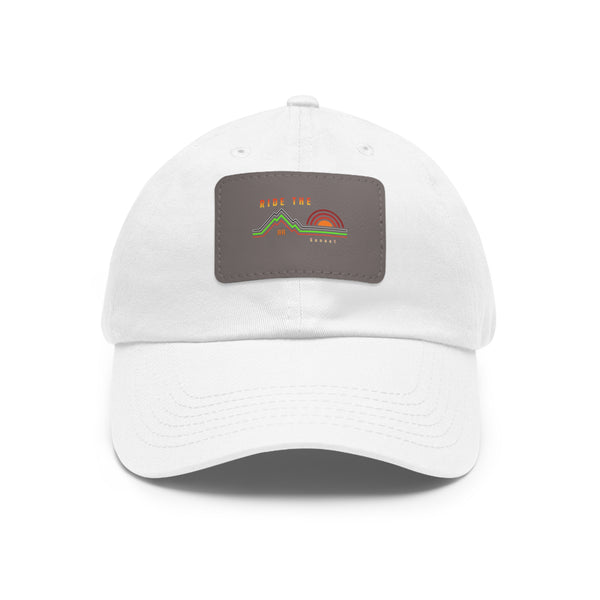White dad hat with rectangular leather patch front, curved brim