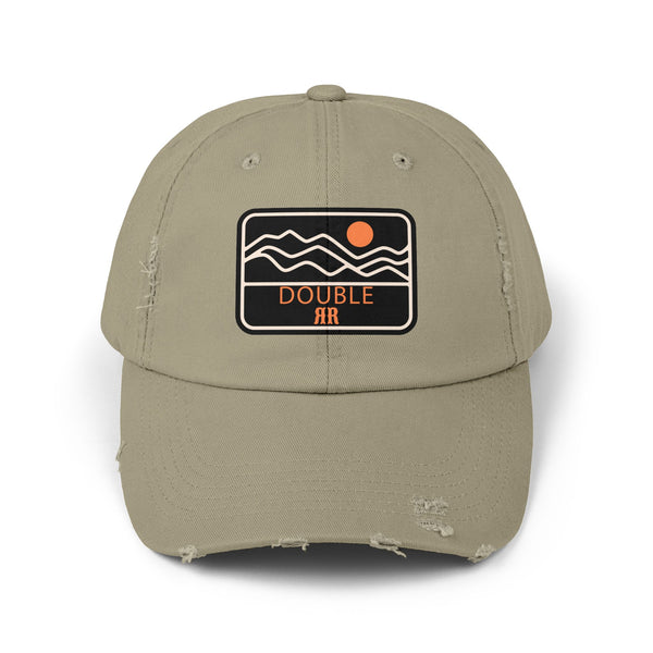 Light olive distressed dad hat with front patch logo and frayed brim
