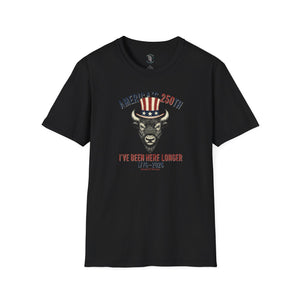 Double R Western heritage tee for America's 250th. Features a vintage American Bison in an Uncle Sam hat with text 'I've Been Here Longer 1776-2026.' High-quality patriotic and historical graphic apparel.