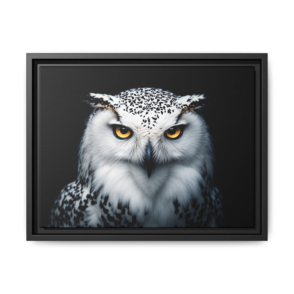 Framed owl wall art with white-spotted head and yellow eyes; black border frame
