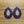 Beaded teardrop drop earrings with blue bead fringe, pink accents, and gold-toned center