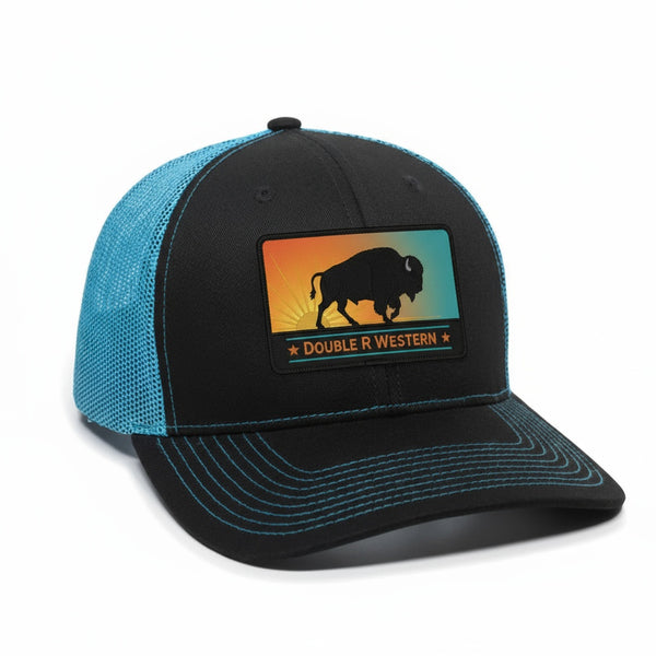Black trucker cap with teal mesh back and front logo patch, curved brim