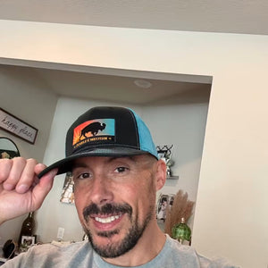 Double R western wear teal trucker hat on customer