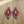 Beaded diamond earrings, front view with red and white bead design