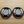 Round beaded mirror earrings, black edging with multicolor bead detail and white centers