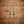 Silver hook earrings with green turquoise beads, red spacers, and dark oval charms