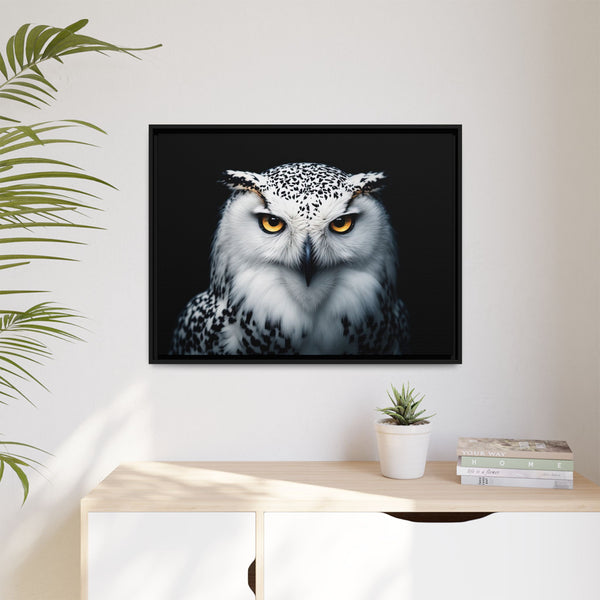 Framed canvas wall art of a snowy owl portrait with amber eyes, black frame