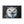 Framed canvas wall art featuring a white and gray owl with amber eyes, silver frame
