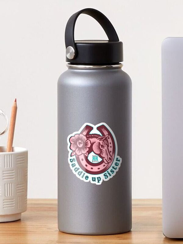 Saddle Up Sister horseshoe glossy sticker applied to a stainless steel water bottle