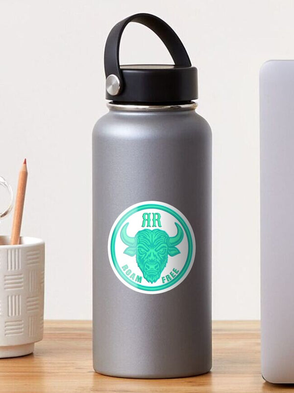 Buffalo face sticker decal on a gray water bottle with teal ROAM FREE circle